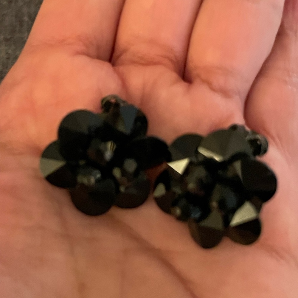 Nice vintage black clip flower earrings. Possibly glass